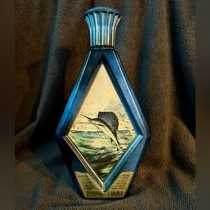 VINTAGE 1975 SAILFISH DECANTER FROM BEAM'S CHOICE WITH JAMES LOCKHART ART